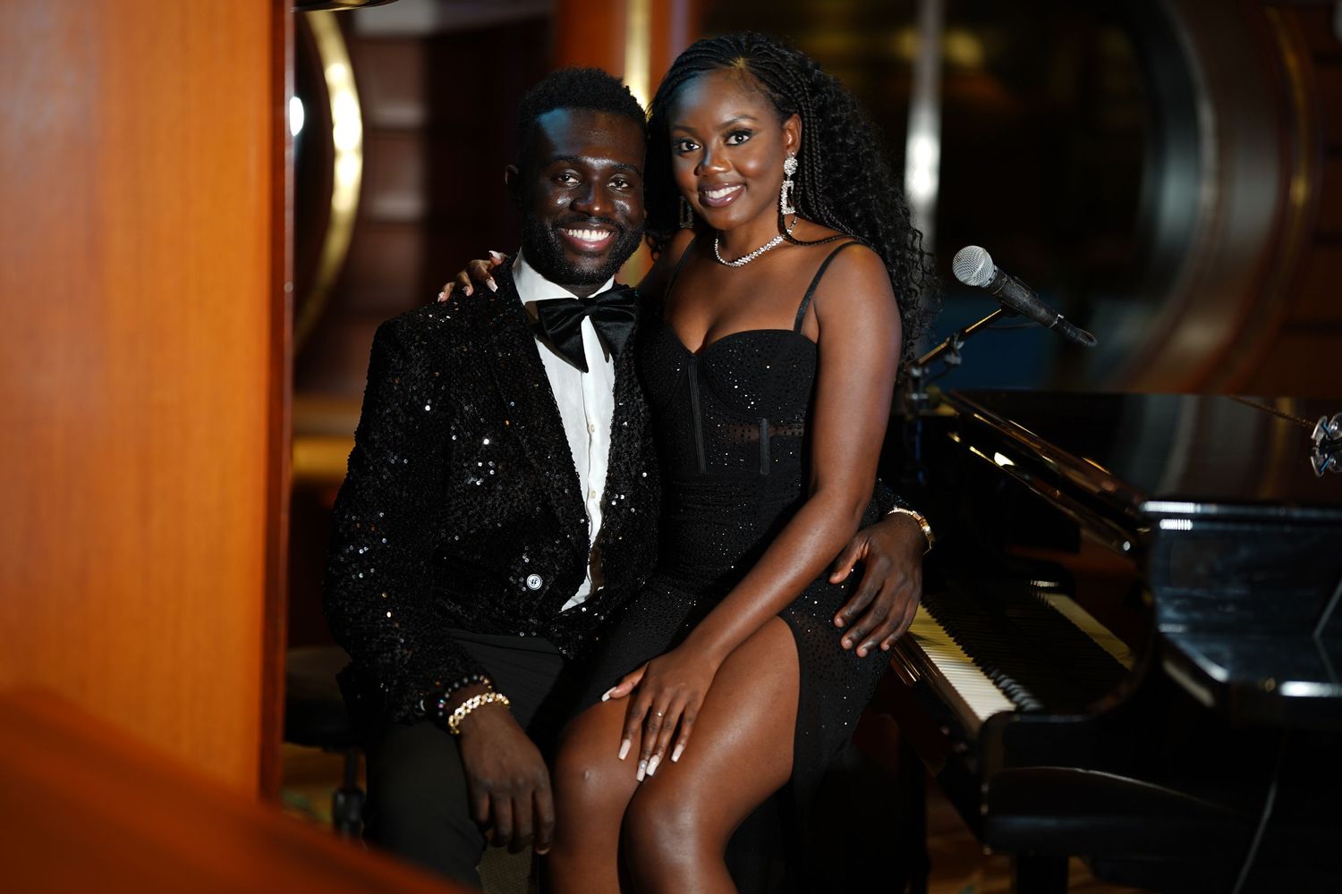 Dimly lit indoor engagement photoshoot scene with romantic ambiance.