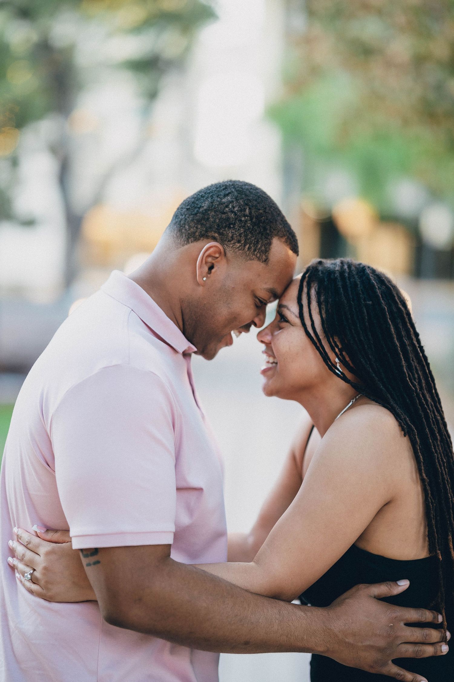 A tender moment between a couple in love outdoors.