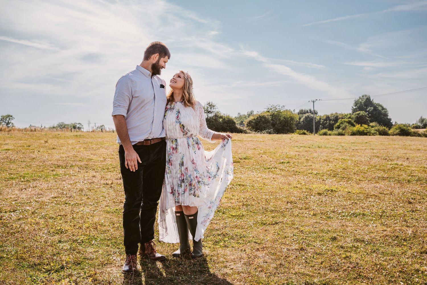 Sweet rural wedding vibe bride and groom looking in love