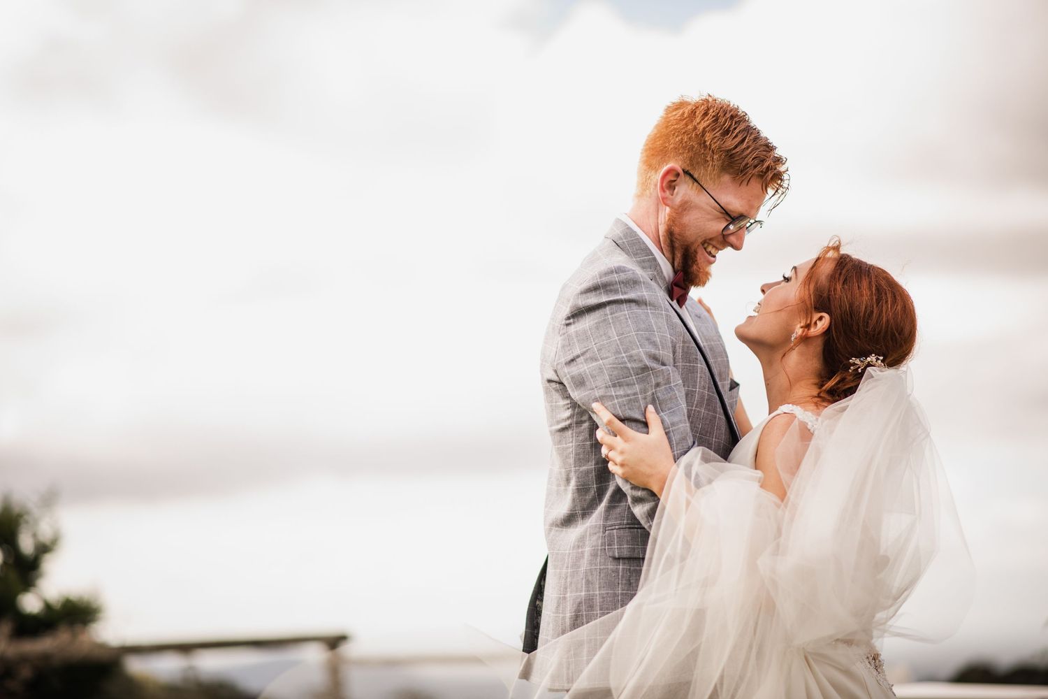 Bride and groom embracing