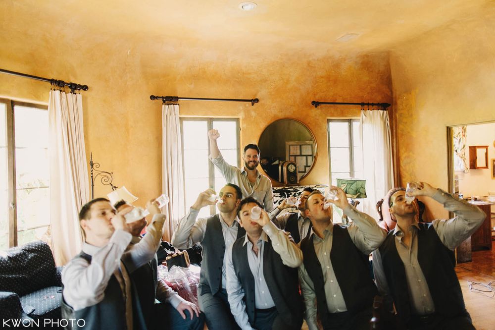 Groom adjusting tie getting ready. Mountain Mermaid Topanga wedding by KWON PHOTO