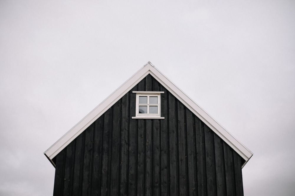Minimalist black and white architectural detail of traditional Nordic house peak.