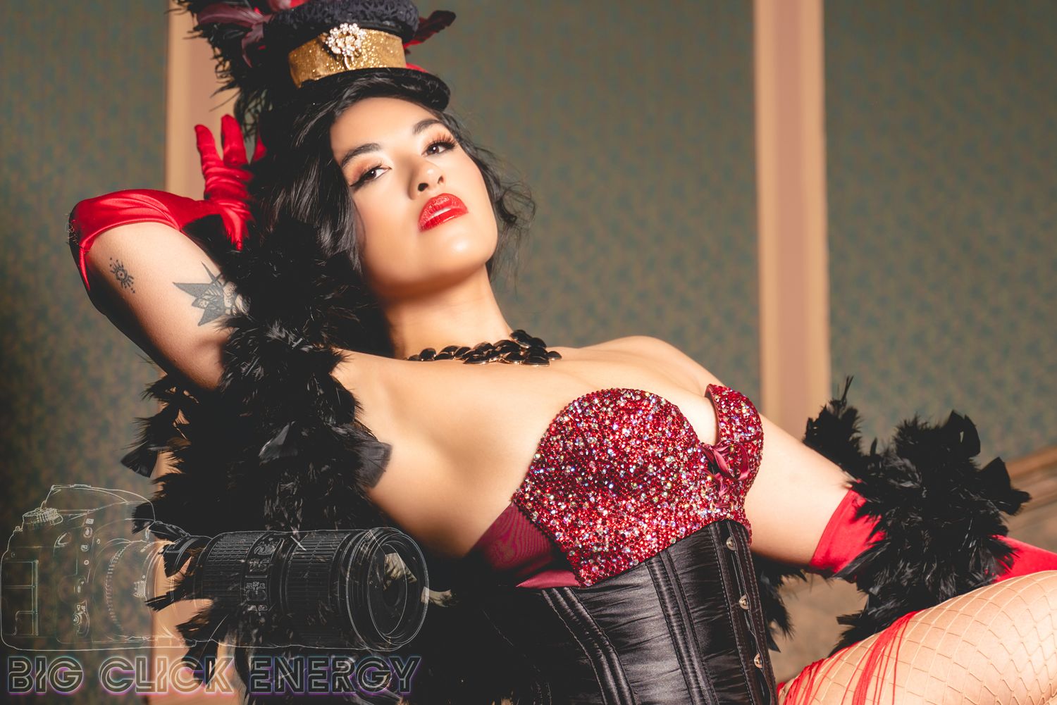 Cabaret, AZ Unzipped, performer, Sexy female model wearing a top hat, corset and lingerie, bra, panties, feathers