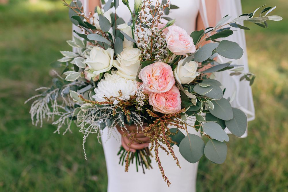 Floral bouquet held by bride