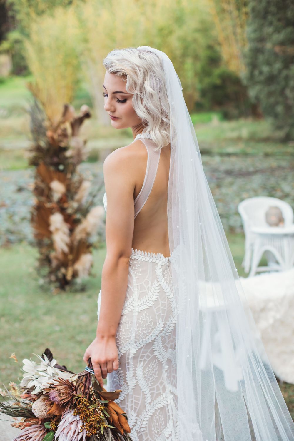 Bride wearing Erin Clare Bridal gown and veil