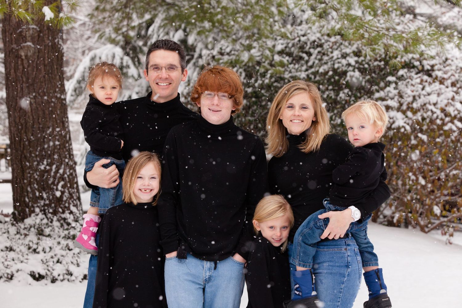 Zionsville photographer - Nathaniel Edmunds Photography - captures family pictures in a snowfall