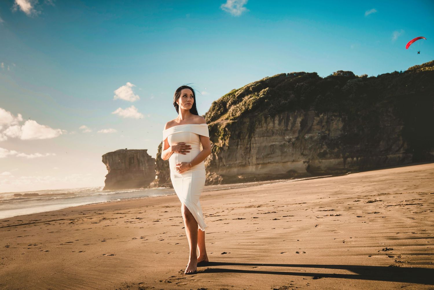 Muriwai beach maternity photographer, parasail white dress beach