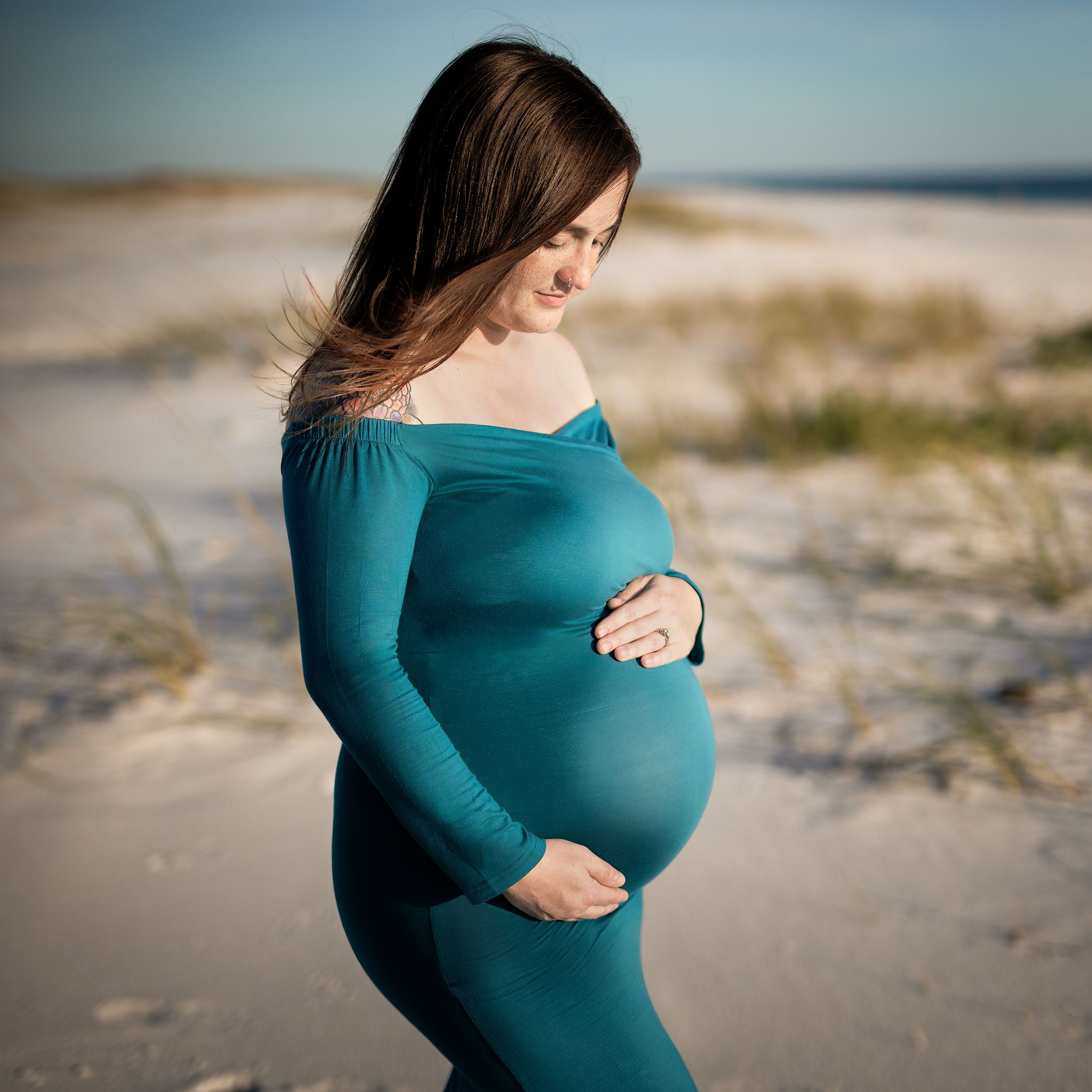Elegant Maternity beside Gulf Coast in Teal Dress