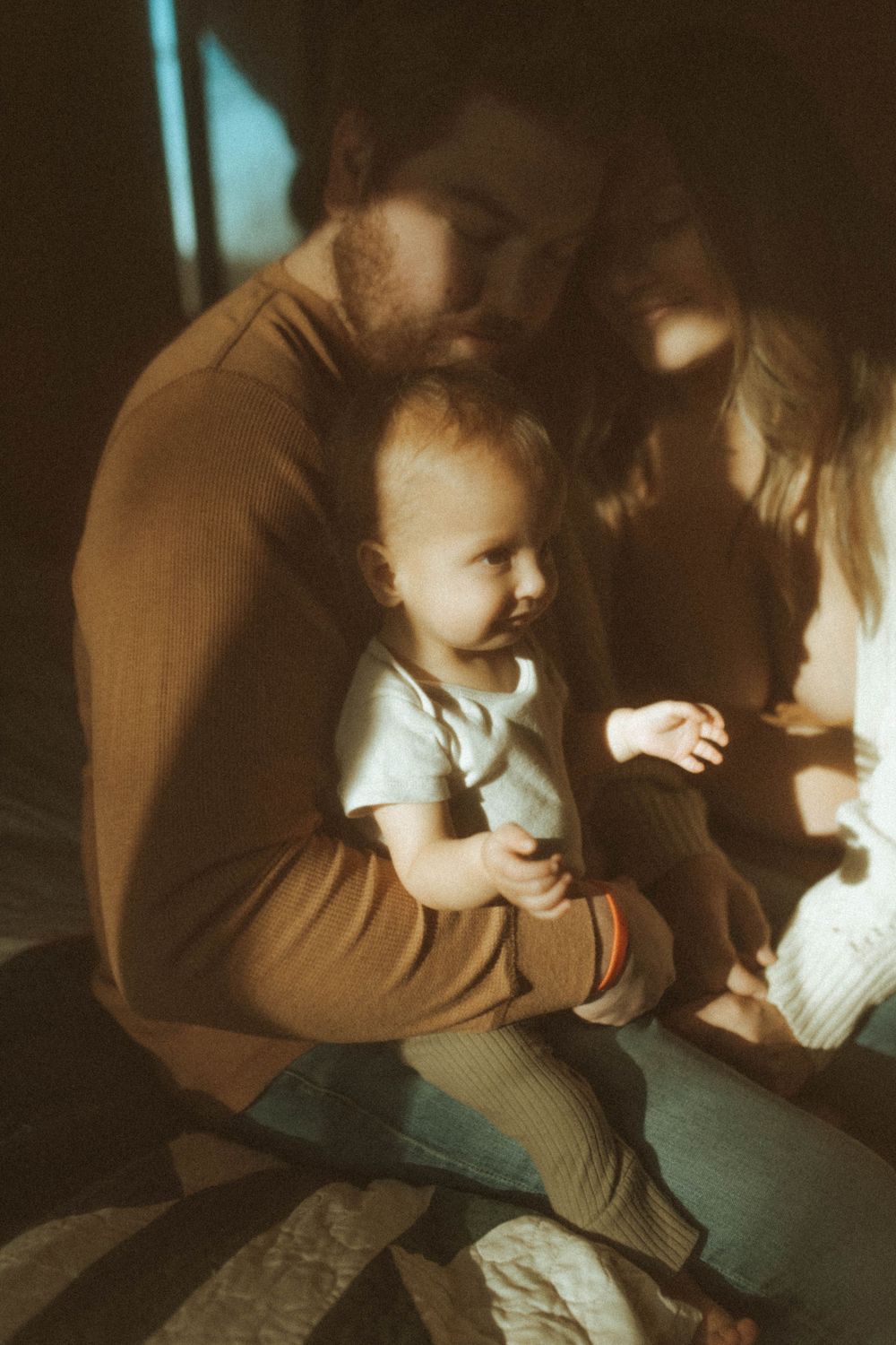 Intimate family gathering captured in warm vintage tones.
