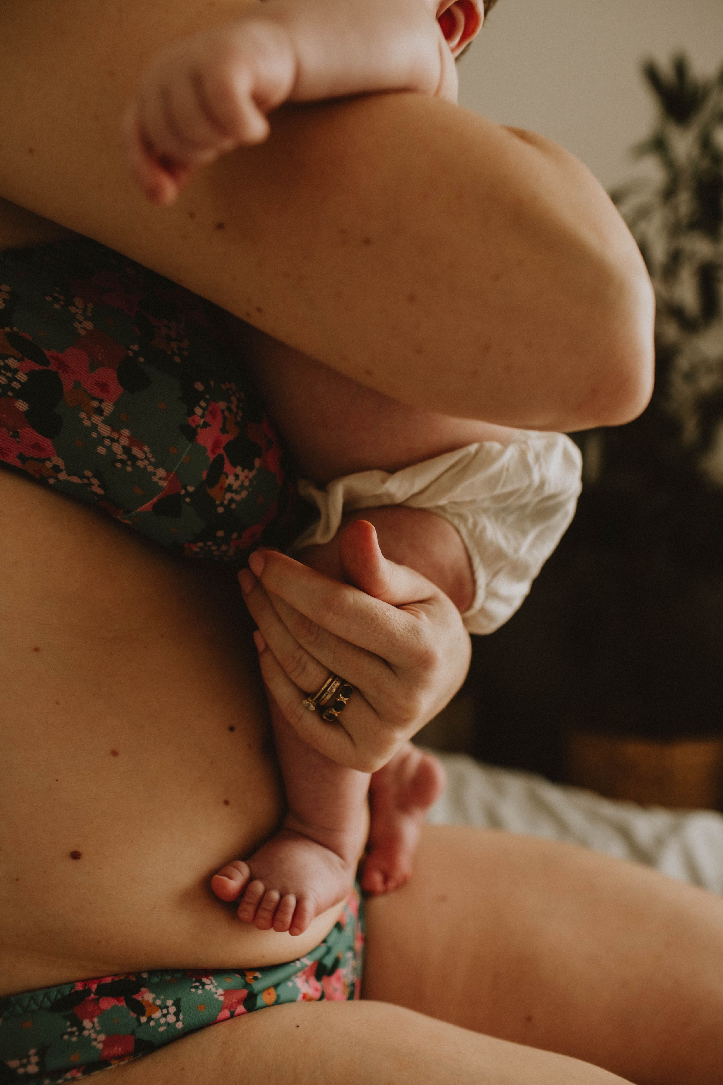 Tiny hands and feet of a newborn during a photography session in Sydney & Northern Beaches, preserving precious details before they grow.