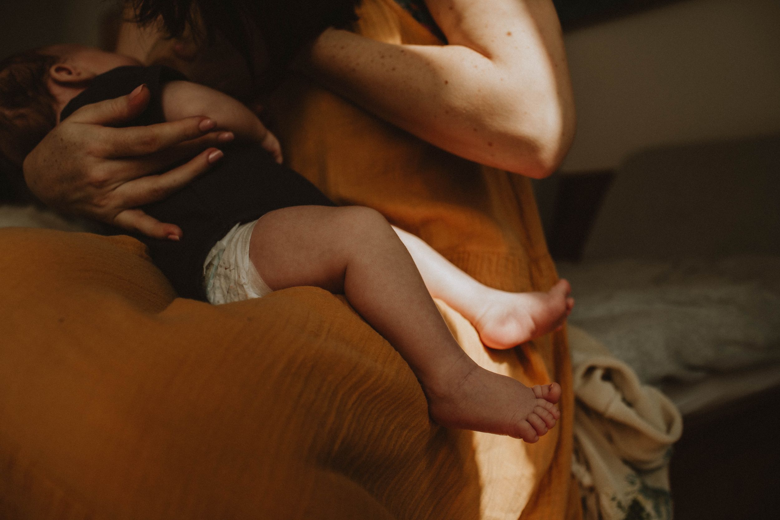 Tiny hands and feet of a newborn during a photography session in Sydney & Northern Beaches, preserving precious details before they grow.