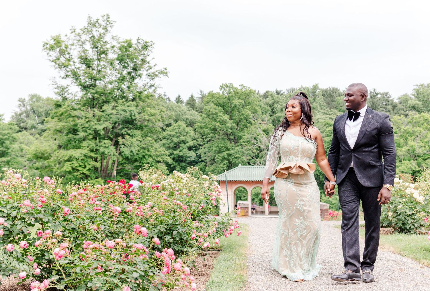 Couple walking in garden during an anniversary session.Danielle Lauren Photography | Hudson Valley, NY