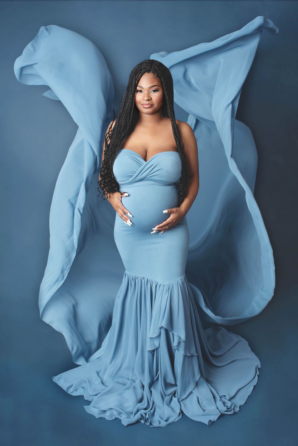beautiful black African American mama in blue with elegant flowing gown dress
