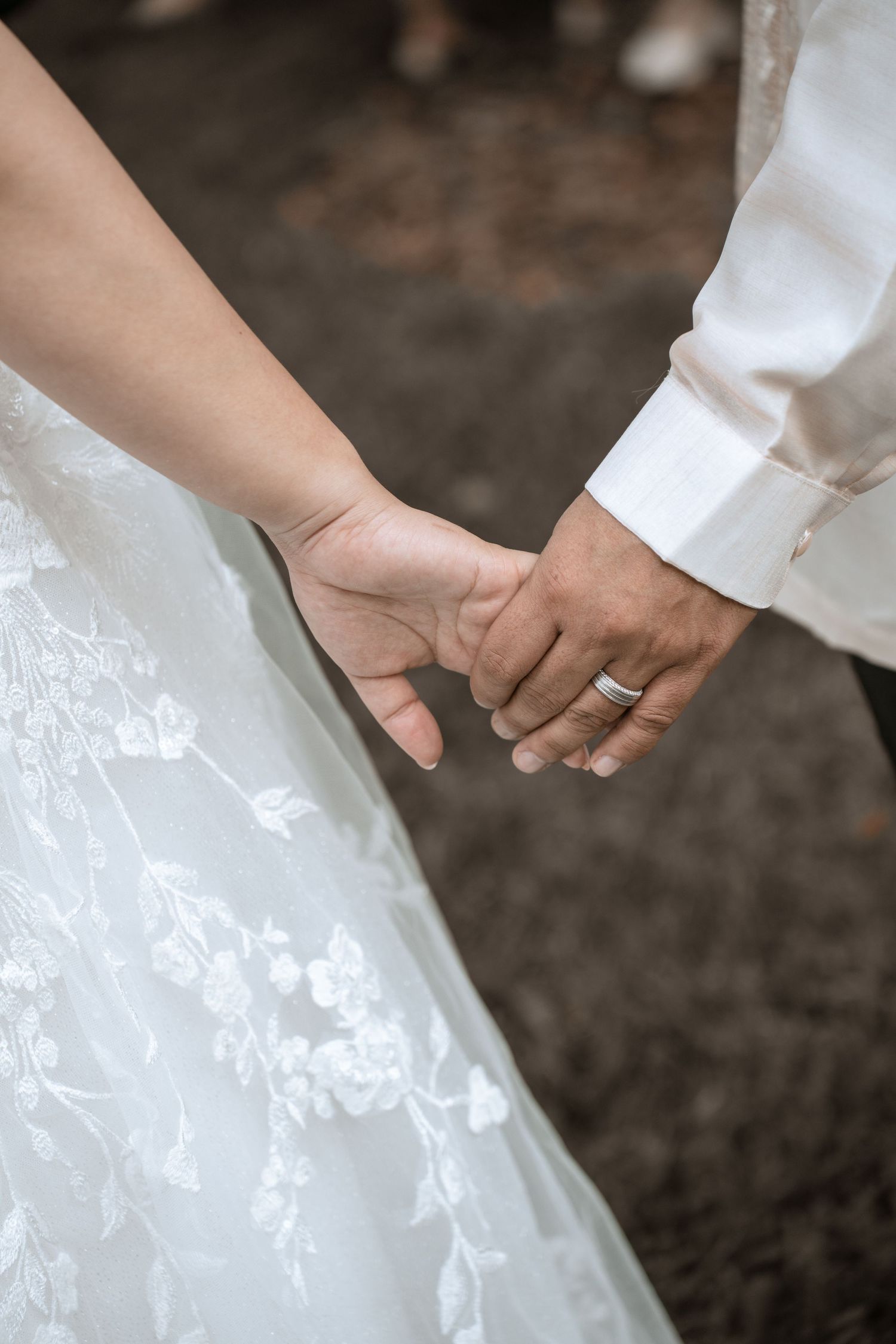 COUPLES HOLDING HANDS