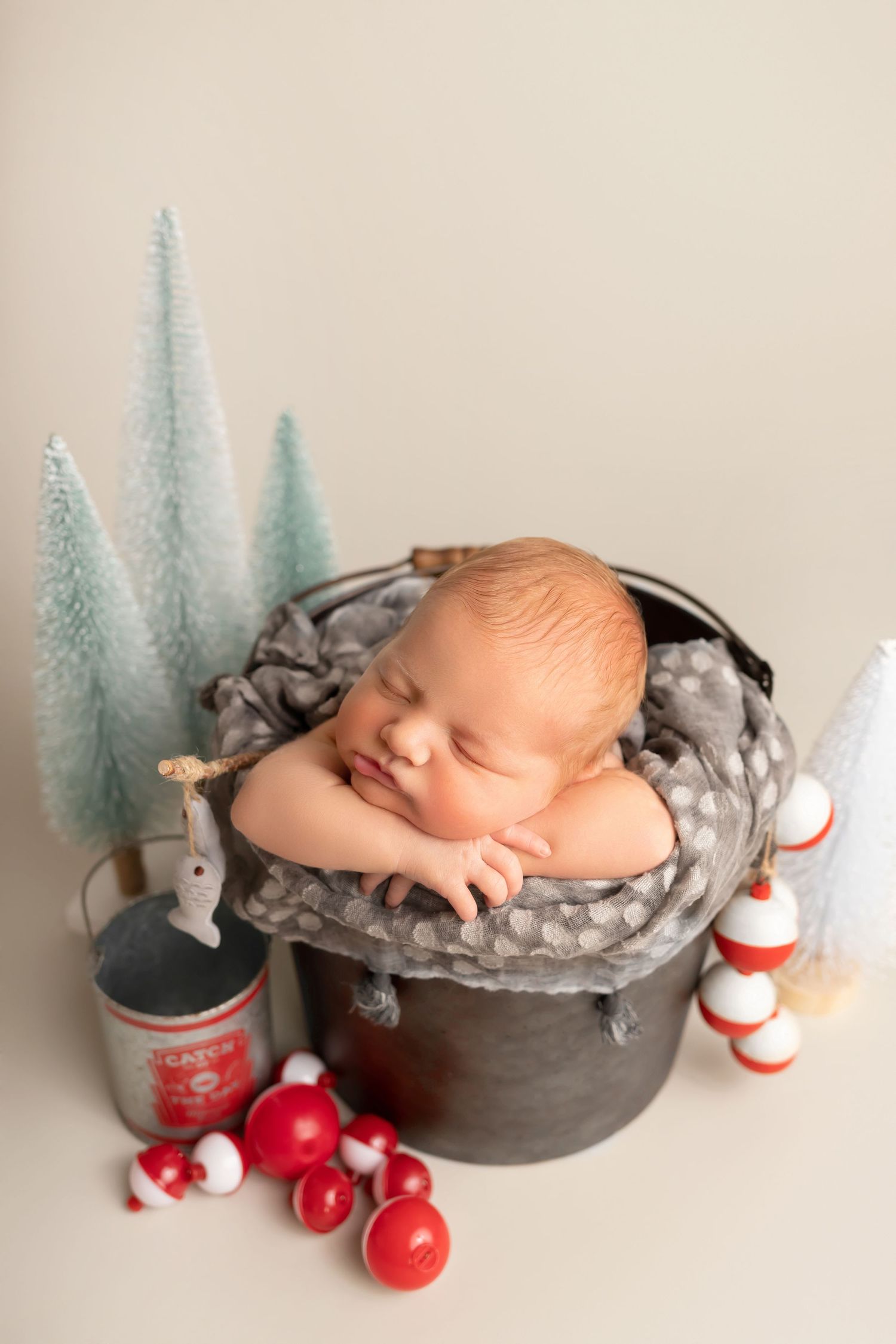 Newborn boy photo, with an ice fishing theme, taken by Jen Knightstep, Photographer