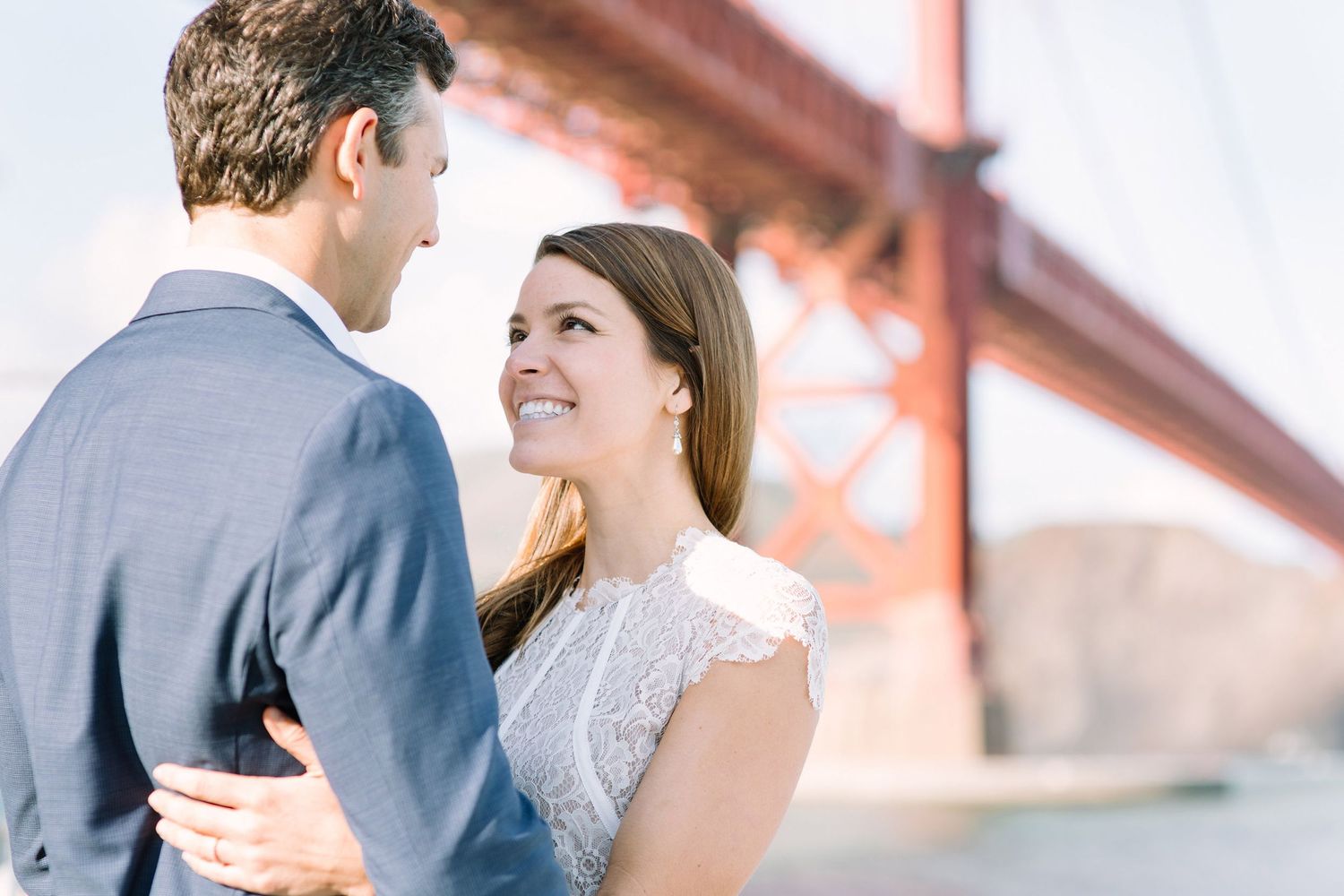 Photograph of bride and groom under San Francisco's Golden Gate Bridge
