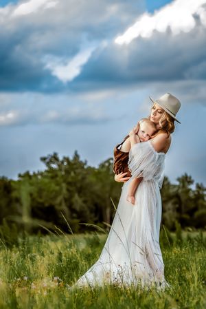 A peaceful moment between a Mom and her little boy.