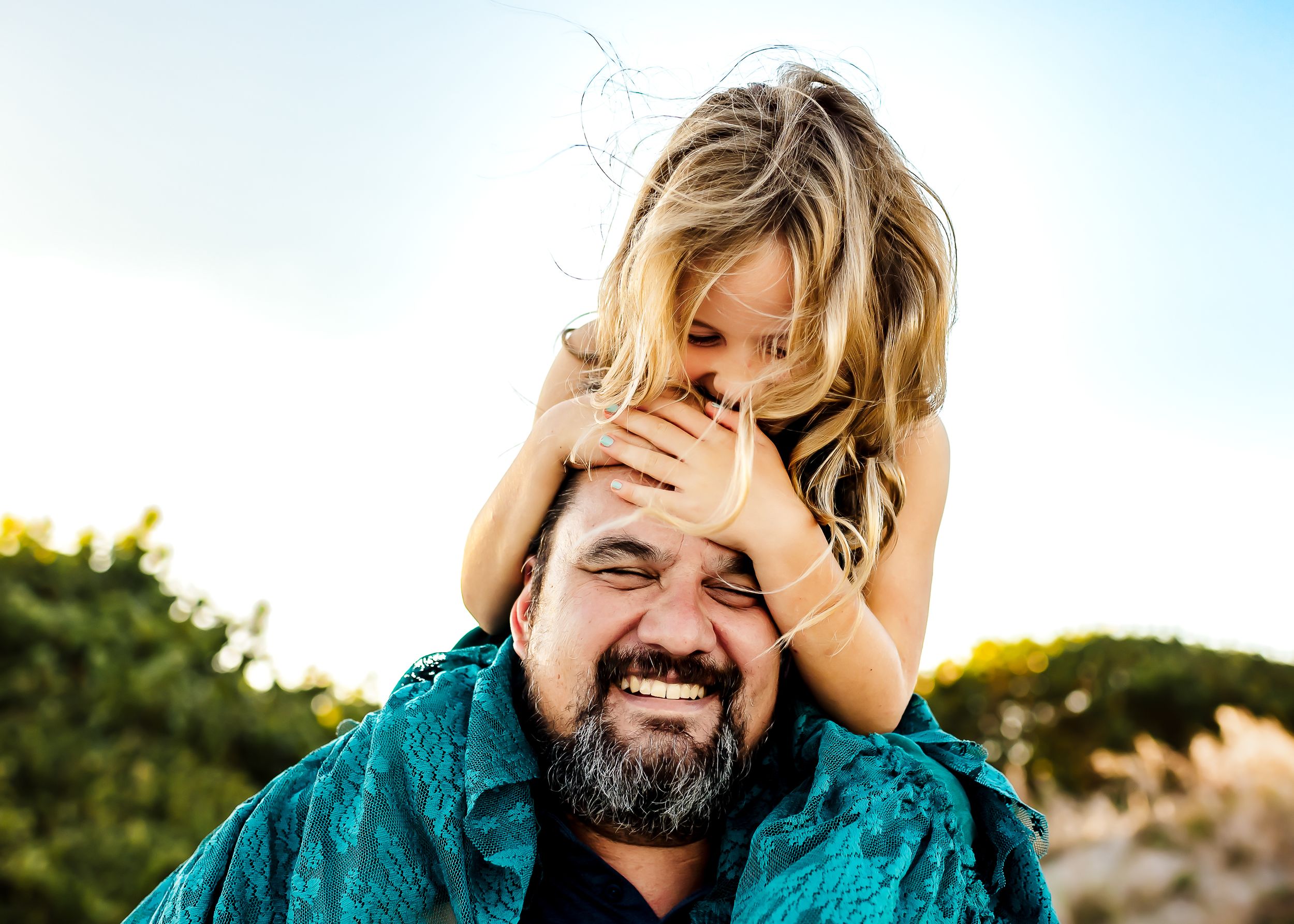 Father and daughter having fun at Cocoa Beach near Orlando, FL.