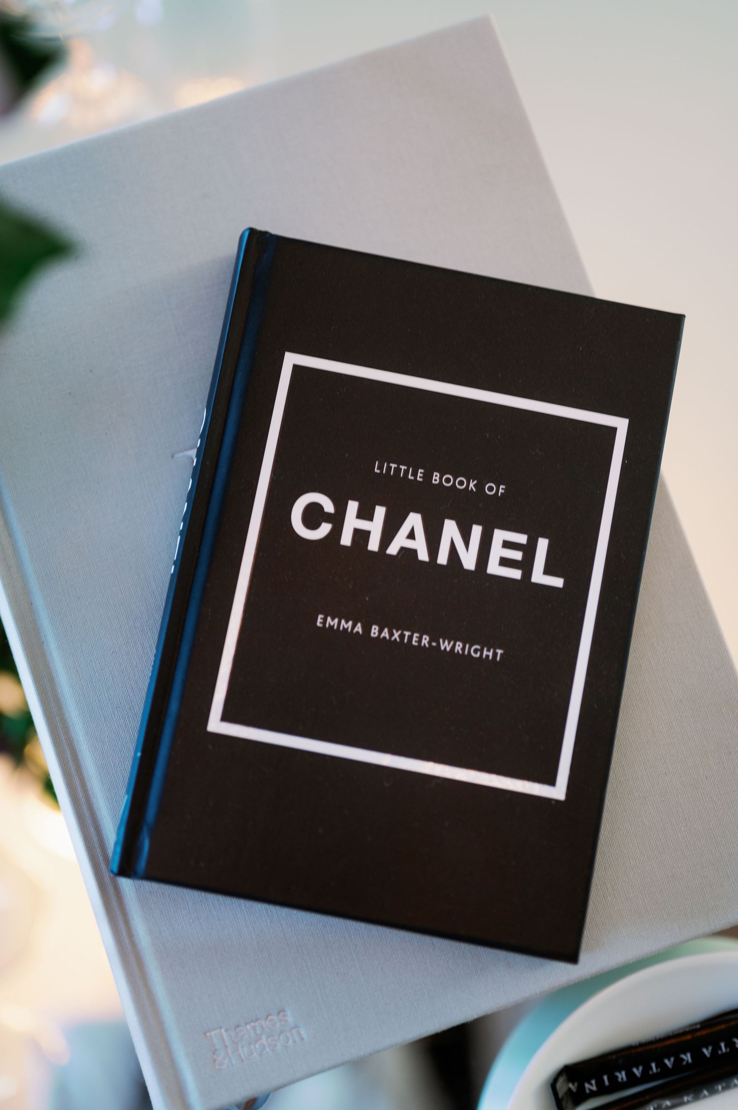 Little Book of Chanel by Emma Baxter-Wright displayed on white surface.