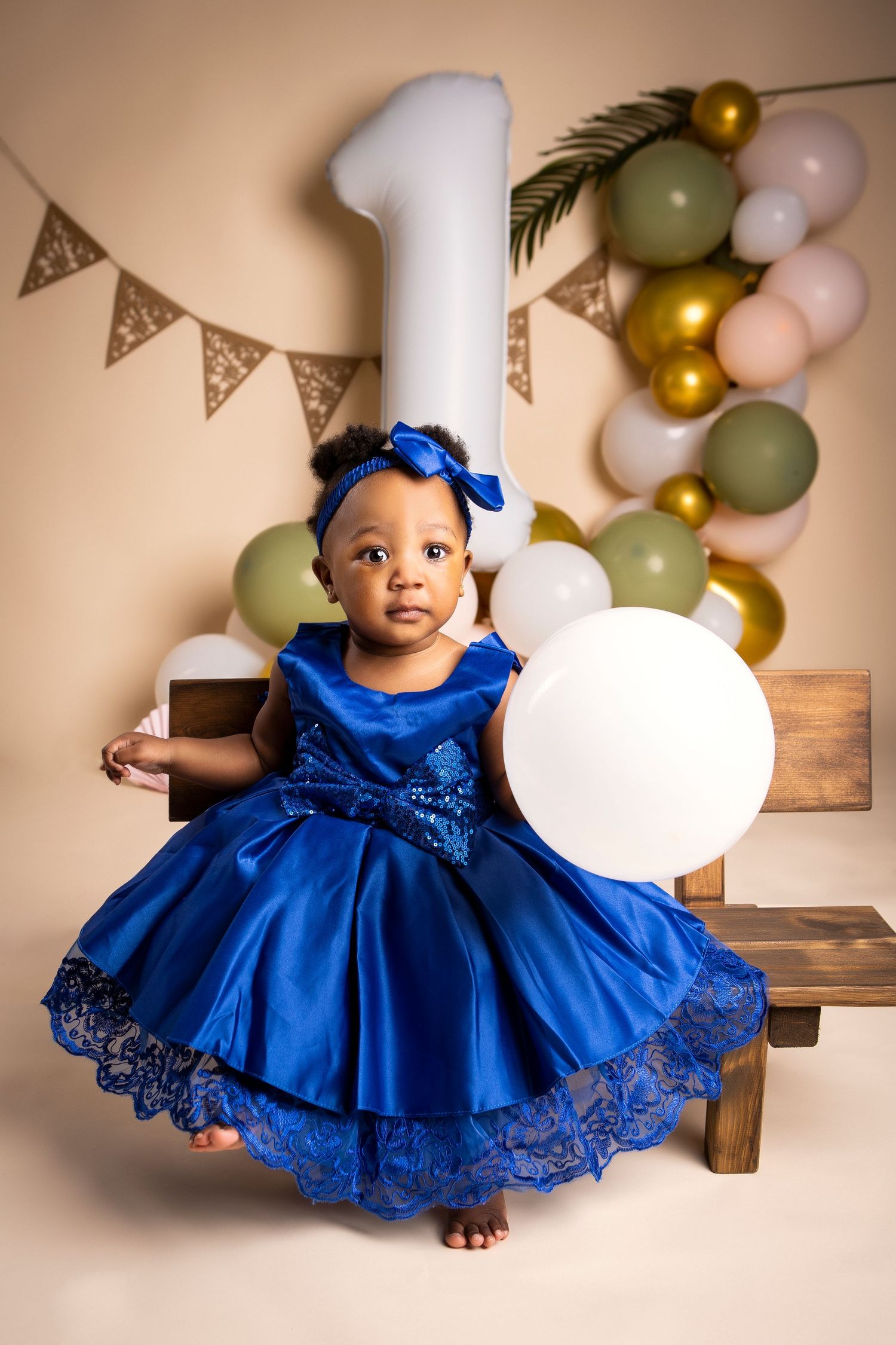 Birthday girl with baloons