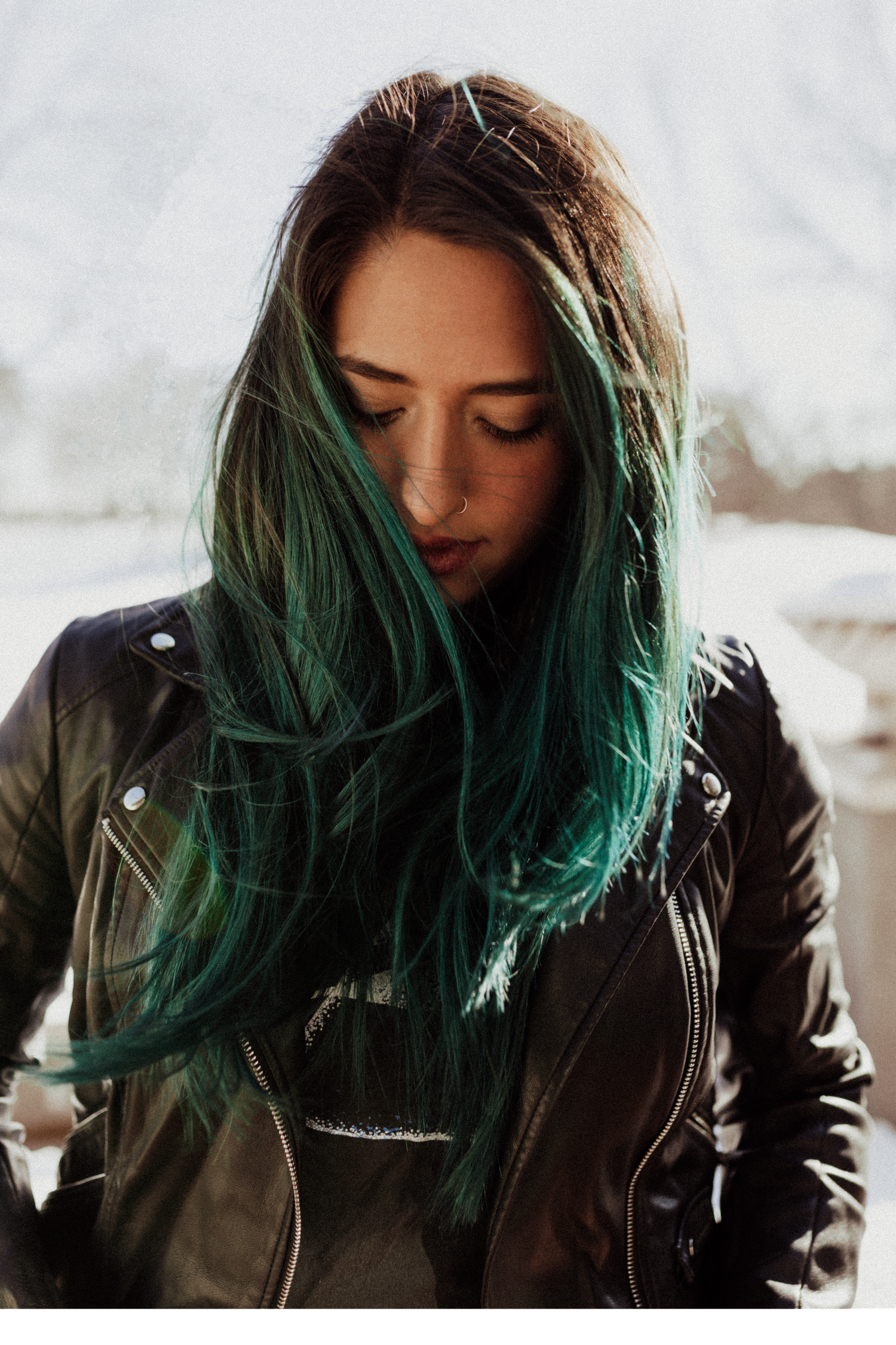 Series of portraits showing teal ombre hair with black leather jacket.