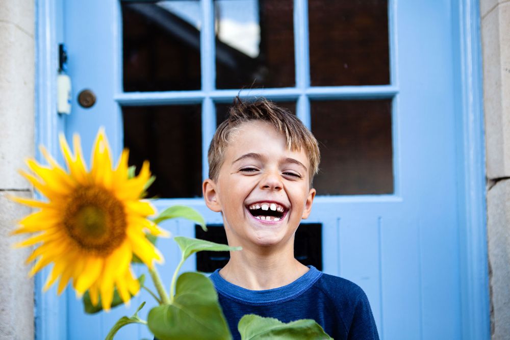 fun alternative family photography in Devon UK and Tuscany Italy by photographer Elizabeth Armitage