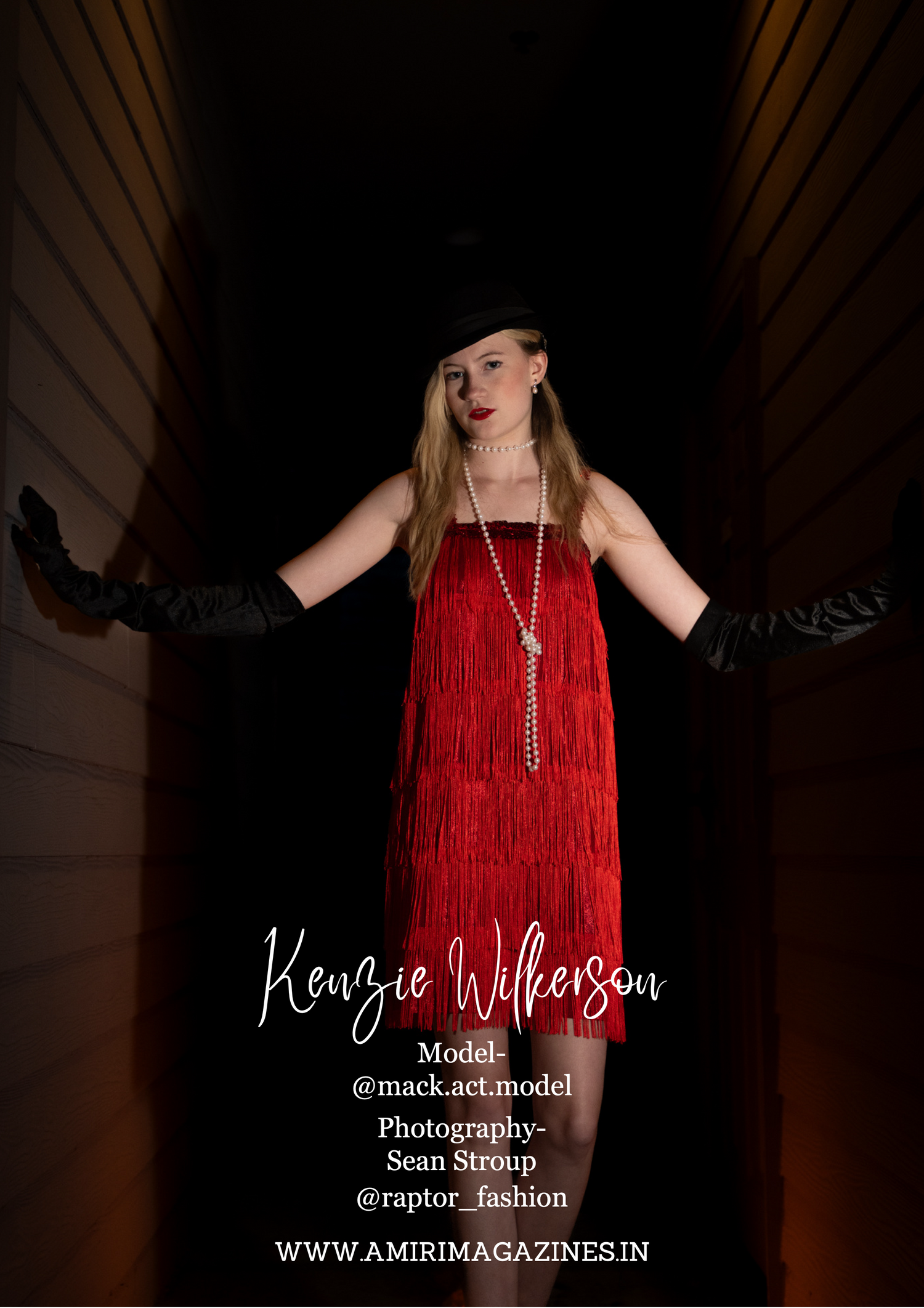 Model wearing red flapper dress and long gloves poses against dark background.