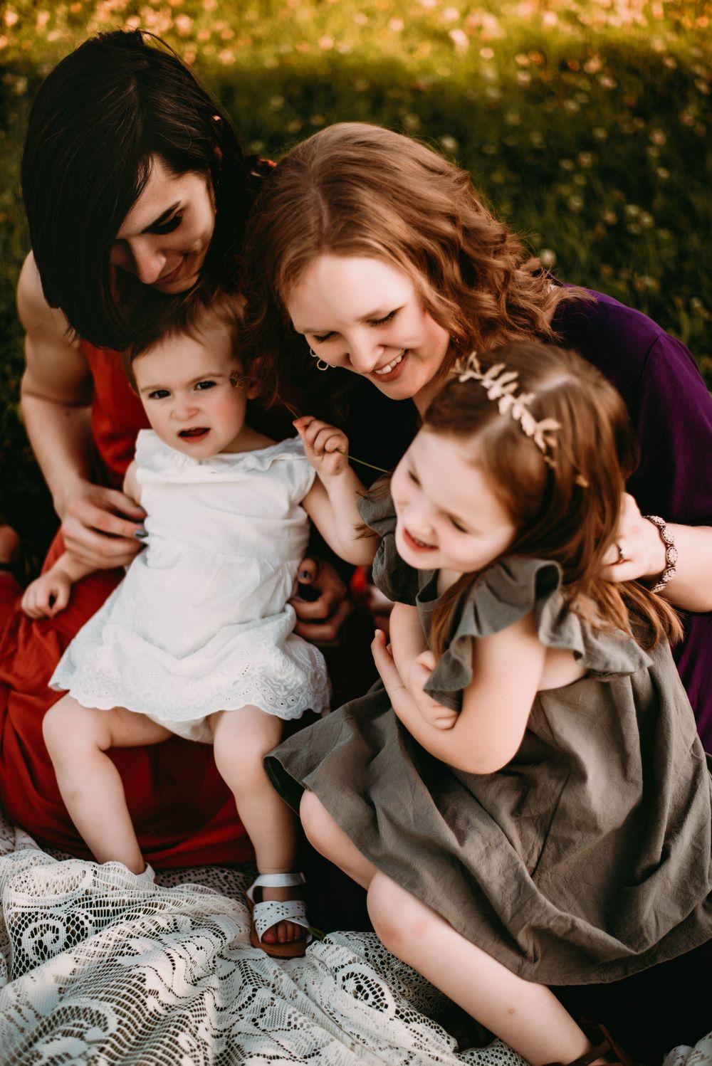 A tender family moment captured in a series of intimate photos showing affectionate embraces in warm lighting.