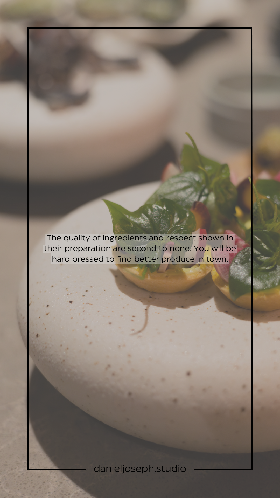 Delicate appetizer with fresh green leaves served on a white stone plate with text overlay.