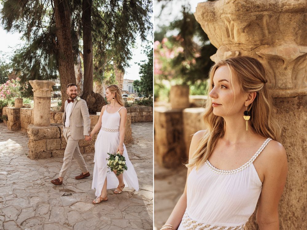 Bride gazing at stone column while groom walks behind her in ancient ruins.