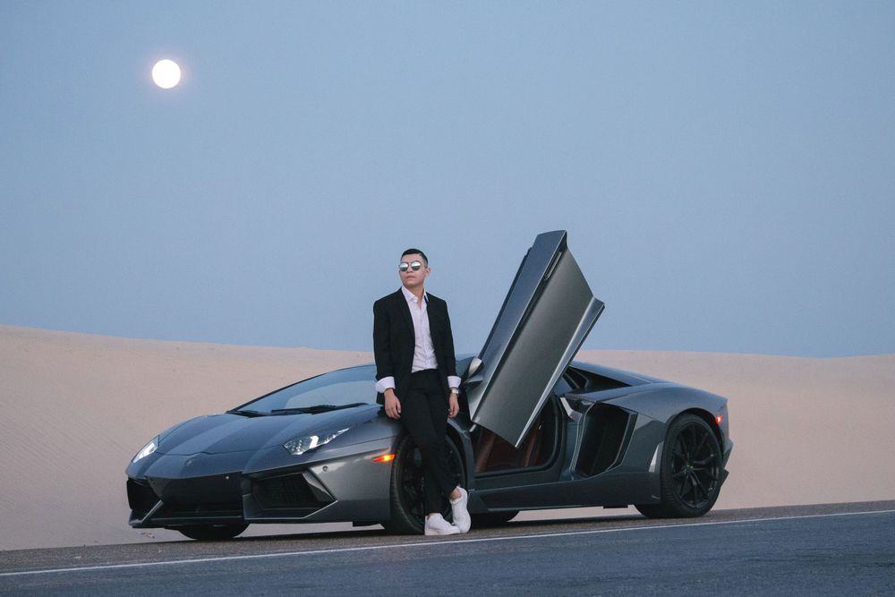 man leaning on his Lamborghini for his photo session. SPI, texas
