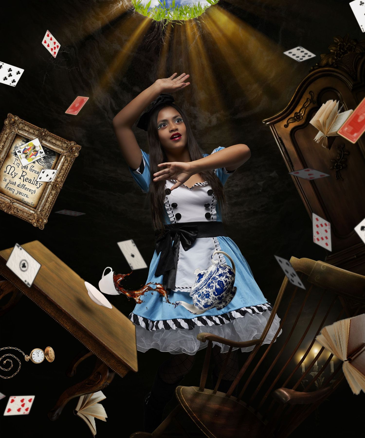 Dramatic photo with flying playing cards and magical lighting in a Wonderland-themed setting.