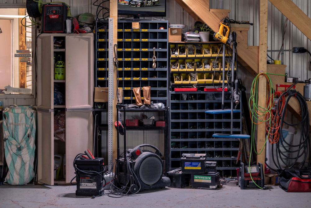 Organized garage workshop interior with tools and storage solutions.