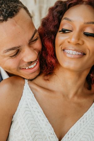 Close-up series of joyful wedding moments showing genuine laughter and happiness.