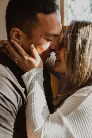 Series of romantic close-up shots showing tender affection between partners.