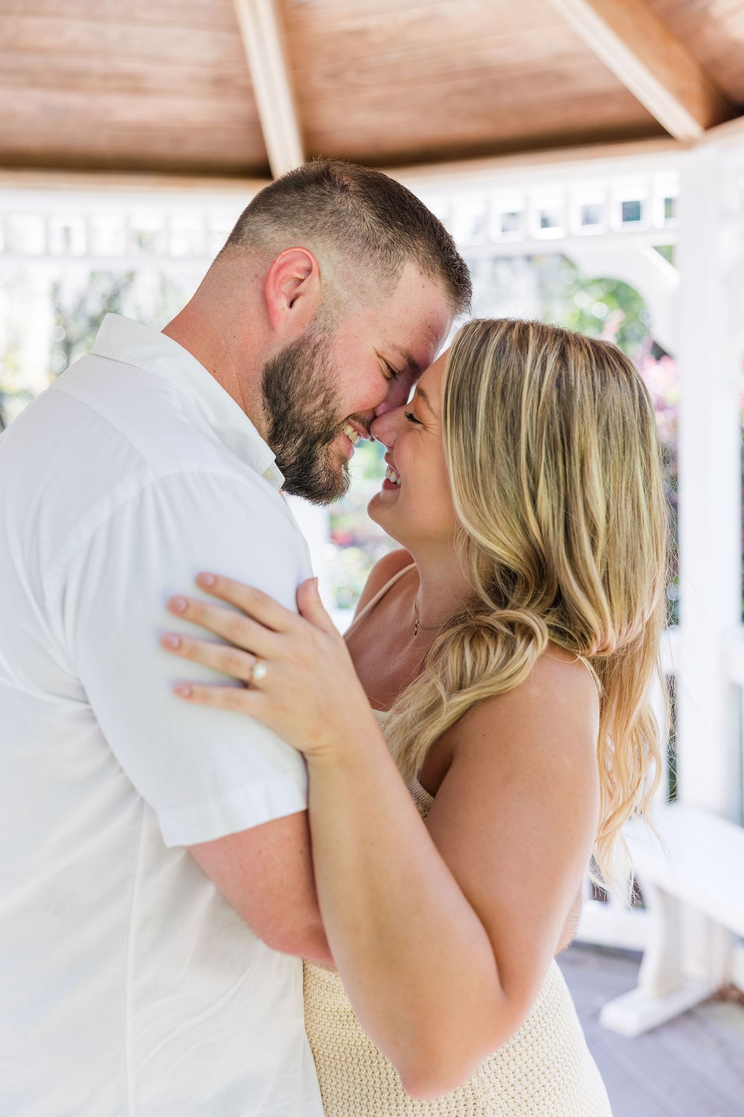 A romantic series of wedding photos showing a couple sharing intimate kisses and embraces.