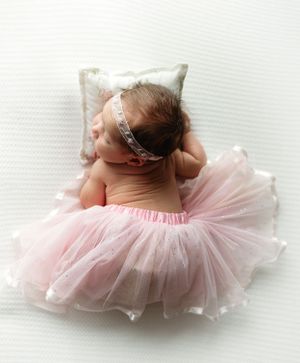 Newborn girl in pretty pink tutu on her belly. - Greenville SC newborn photographer - Easley SC newborn photographer