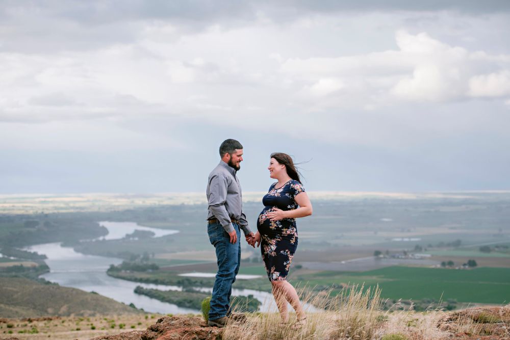 Expecting couple on vista during a storm