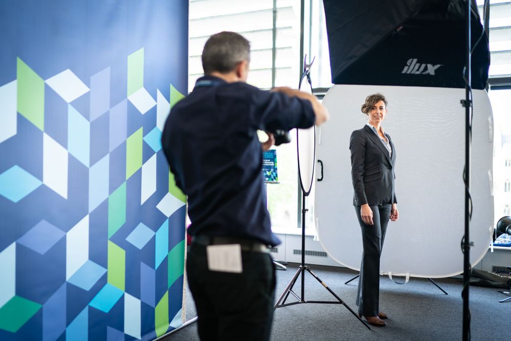 Delegates pose for complimentary headshots during the CFA Global Leadership Conference in London