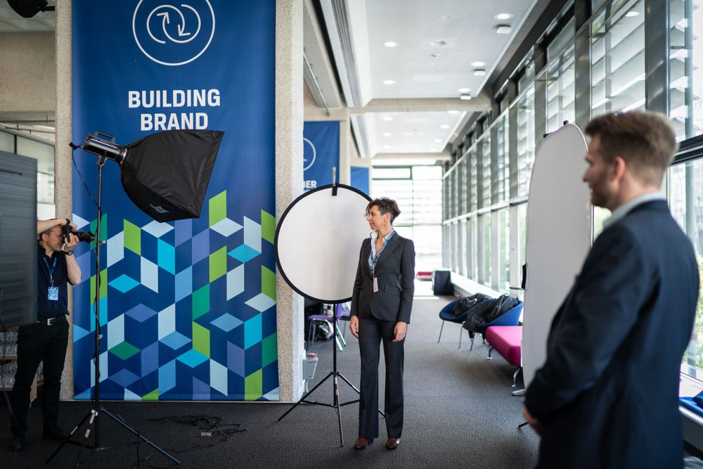 Delegates pose for complimentary headshots during the CFA Global Leadership Conference in London