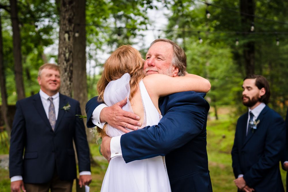 Wedding ceremony moments captured in an outdoor garden setting.