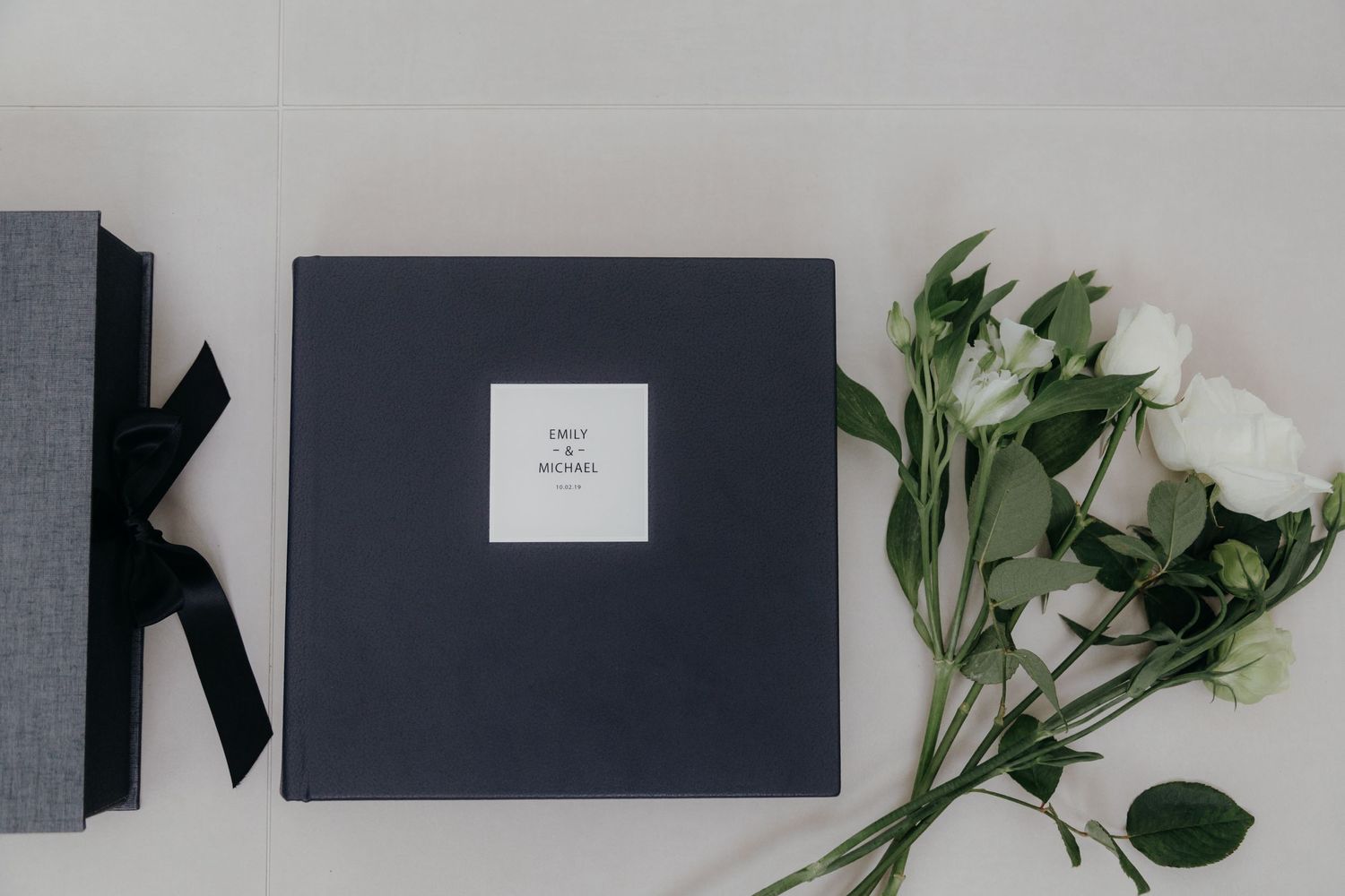 Emily and mike wedding album duo with leather cover