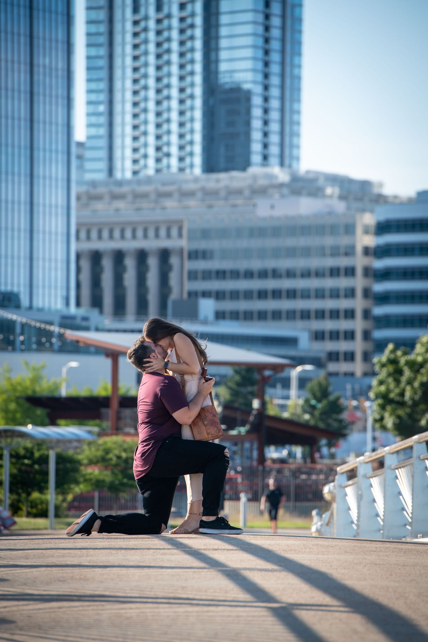 Milwaukee couple kissing after surprise proposal