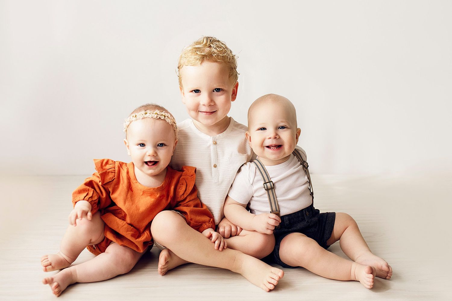 studio baby photographer studio milestone session baby cousins San Antonio photographer