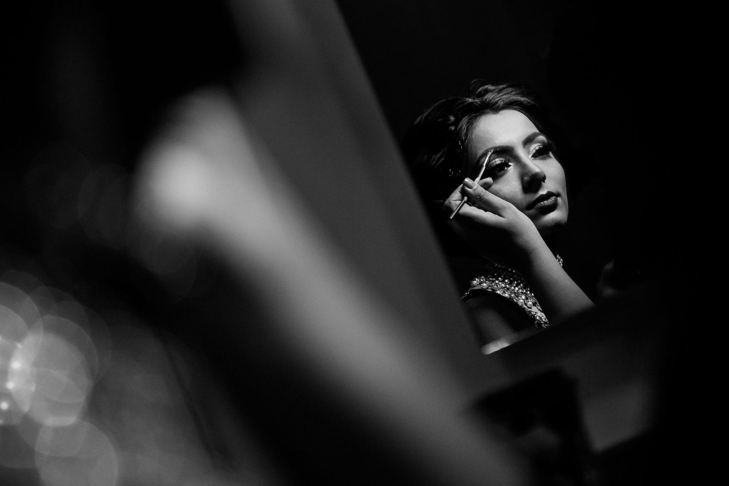 Rupal having her makeup done moments before her entrance at Sattavis Patidar Centre in Wembley