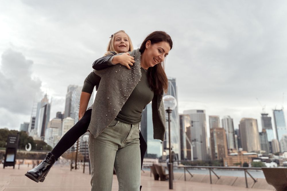 Mom and daughter is playing in Sydney during a family photoshoot