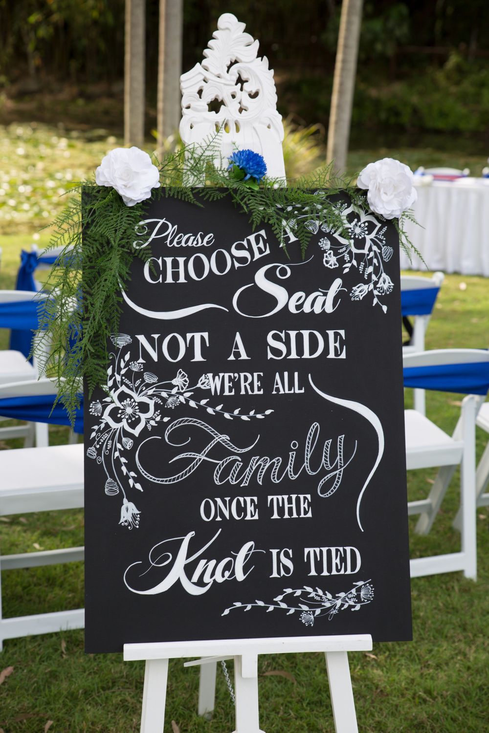 Wedding ceremony seating signs with elegant chalk lettering display welcome messages for guests.