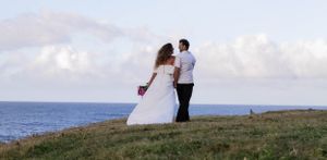 Couple celebrate wedding in cliff top, wedding photography, Dorset Wedding photography
