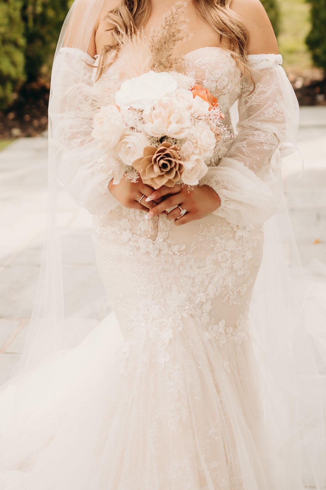 bride holding bouquet of flowers