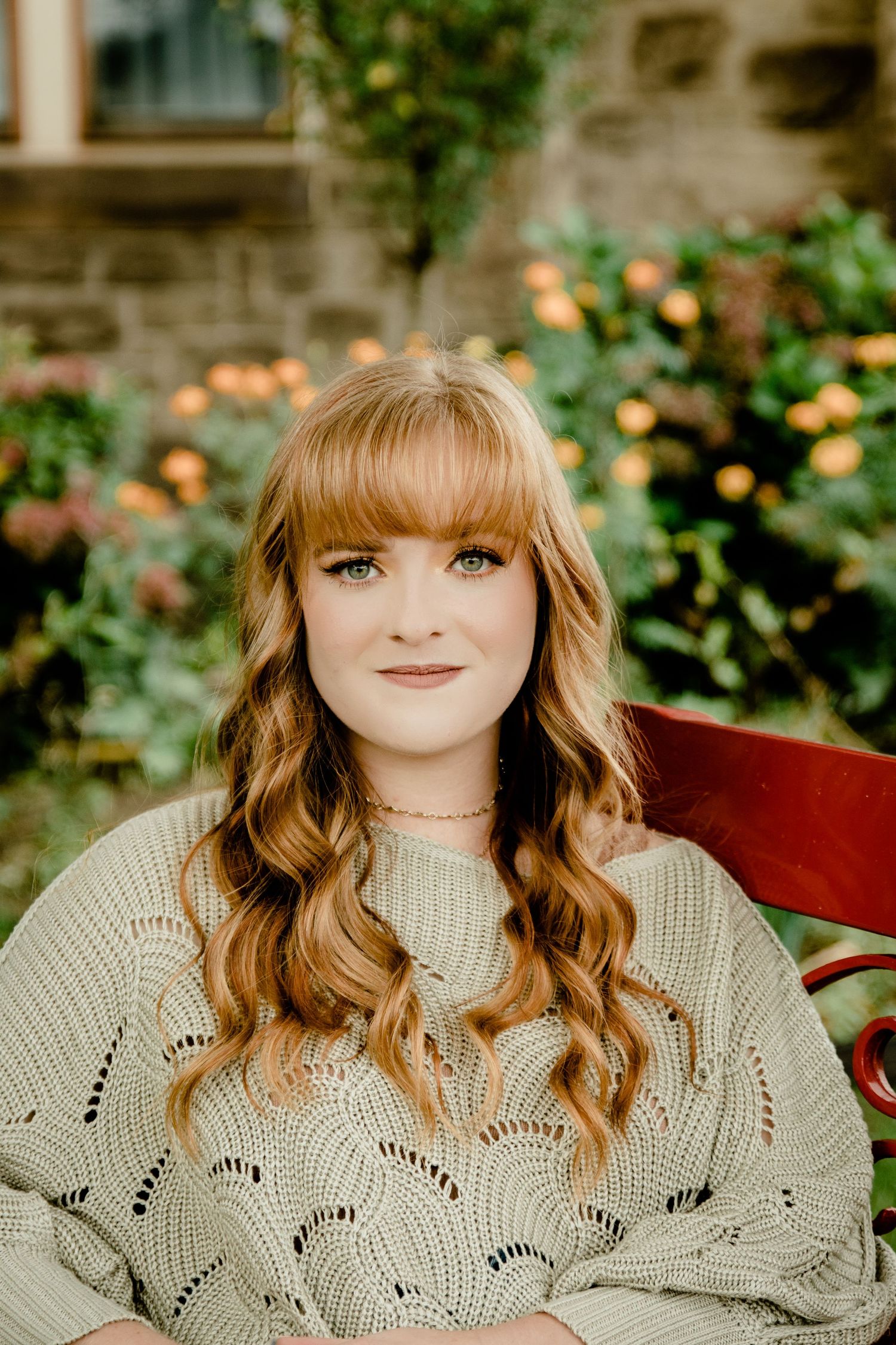 Beautiful Red Head Green Eyes in wildflower Senior Photo